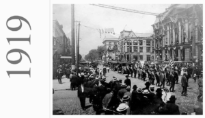 Black and white Veterans Day Parade photo from 1919.